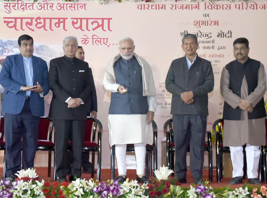 The Prime Minister, Shri Narendra Modi launching the Char Dham Rajmarg Vikas Pariyojna, at Dehradun, Uttarakhand on December 27, 2016. The Governor of Uttarakhand, Dr. K.K. Paul, the Union Minister for Road Transport & Highways and Shipping, Shri Nitin Gadkari, the Chief Minister of Uttarakhand, Shri Harish Rawat and the Minister of State for Petroleum and Natural Gas (Independent Charge), Shri Dharmendra Pradhan are also seen.
